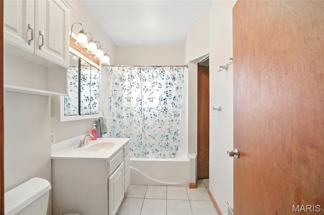 4934 Tiemann Ave, Saint Louis, MO 63123 - bathroom featuring vanity, tile patterned floors, and shower / bath combo with shower curtain
