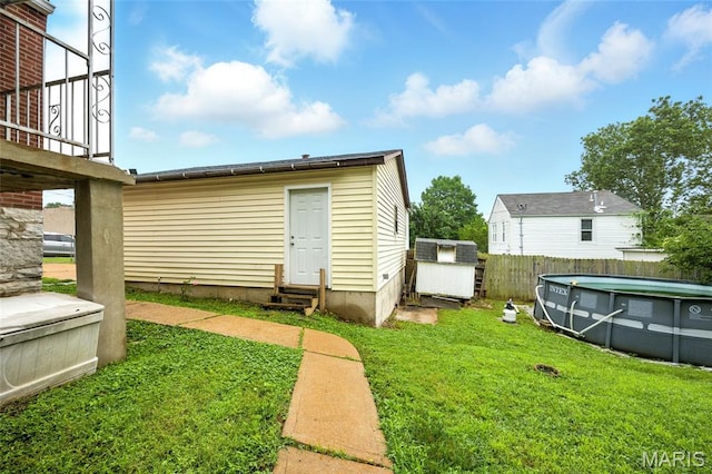 4934 Tiemann Ave, Saint Louis, MO 63123 - view of yard with entry steps and an outbuilding