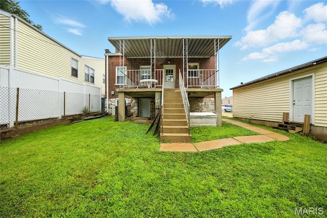 4934 Tiemann Ave, Saint Louis, MO 63123 - back of house featuring brick siding and stairs