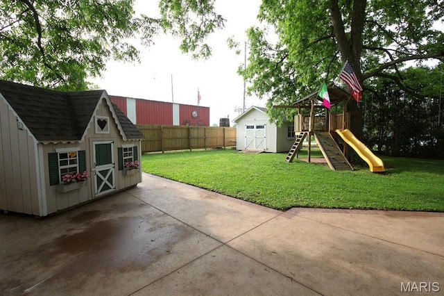302 N Main St, Saint Elmo, IL 62458 - fenced backyard with a shed and a playground