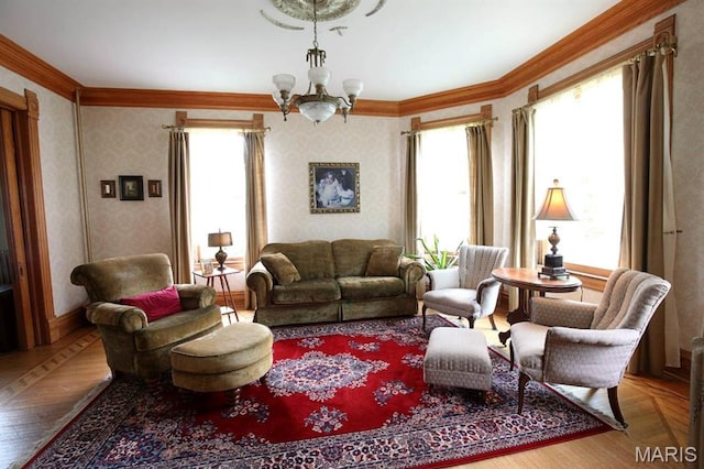 302 N Main St, Saint Elmo, IL 62458 - living room featuring a chandelier, crown molding, and parquet floors