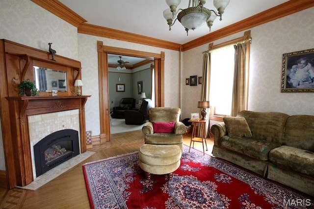 302 N Main St, Saint Elmo, IL 62458 - living room featuring crown molding, wallpapered walls, a chandelier, wood finished floors, and a tile fireplace