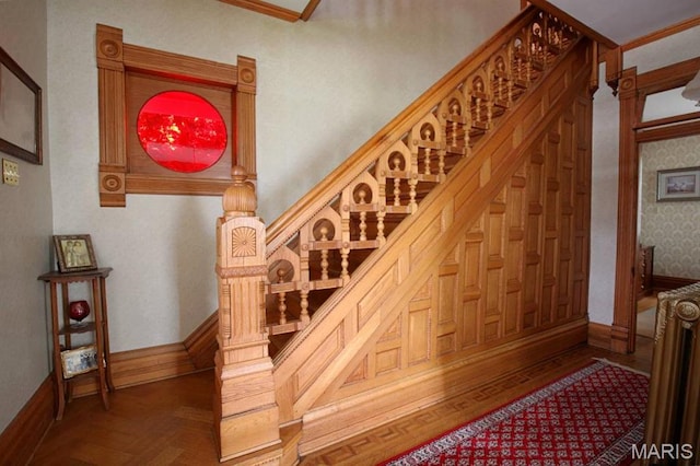 302 N Main St, Saint Elmo, IL 62458 - staircase featuring crown molding and wallpapered walls