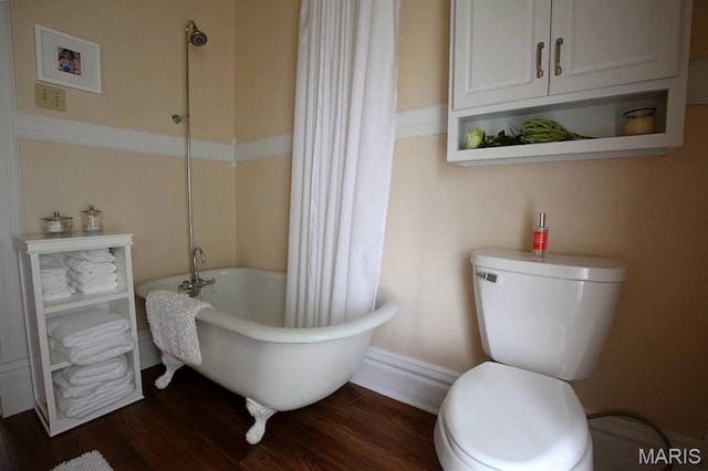302 N Main St, Saint Elmo, IL 62458 - full bath featuring wood finished floors and toilet