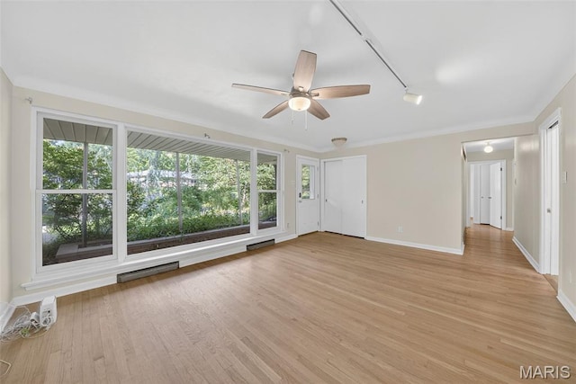 3 Cardigan Ln, Saint Louis, MO 63135 - unfurnished living room featuring light wood-type flooring, a ceiling fan, and track lighting