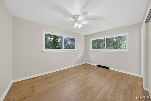 3 Cardigan Ln, Saint Louis, MO 63135 - spare room featuring light wood-type flooring and ceiling fan
