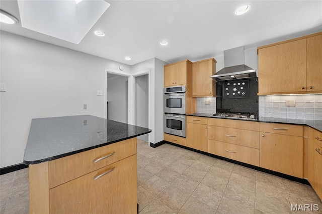 3 Cardigan Ln, Saint Louis, MO 63135 - kitchen featuring wall chimney exhaust hood, stainless steel appliances, decorative backsplash, recessed lighting, and dark stone counters
