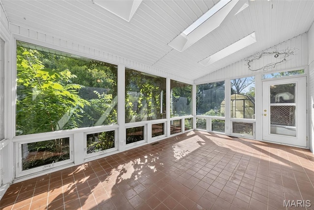 3 Cardigan Ln, Saint Louis, MO 63135 - unfurnished sunroom featuring a skylight and vaulted ceiling