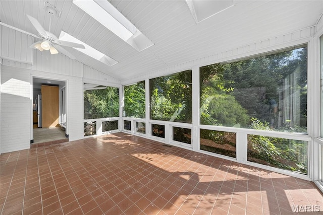 3 Cardigan Ln, Saint Louis, MO 63135 - unfurnished sunroom with ceiling fan, a skylight, and lofted ceiling