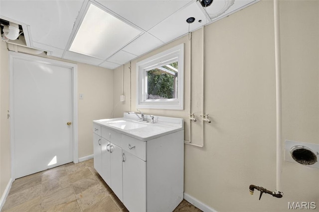 3 Cardigan Ln, Saint Louis, MO 63135 - bathroom with baseboards and vanity