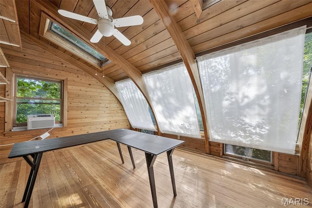 3 Cardigan Ln, Saint Louis, MO 63135 - recreation room with a skylight, lofted ceiling, cooling unit, hardwood / wood-style floors, and wood walls