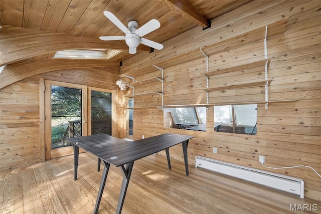 3 Cardigan Ln, Saint Louis, MO 63135 - playroom with a baseboard radiator, a wood ceiling with exposed beams, wood walls, wood finished floors, and ceiling fan