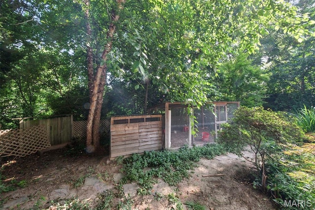 3 Cardigan Ln, Saint Louis, MO 63135 - view of yard with exterior structure and an outbuilding