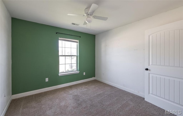 111 Brush Creek Pkwy, Saint Robert, MO 65584 - carpeted spare room with ceiling fan and baseboards
