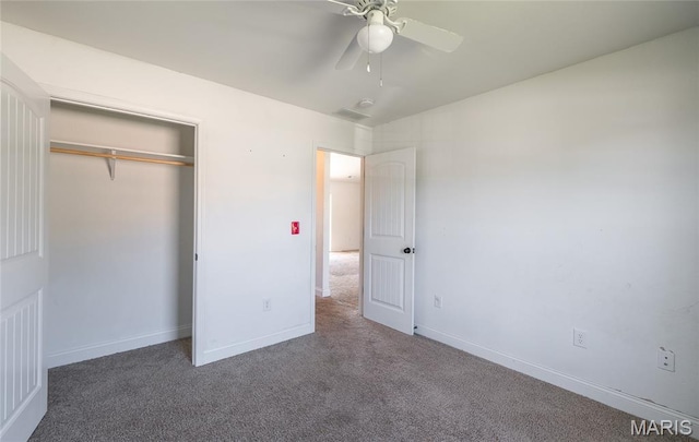 111 Brush Creek Pkwy, Saint Robert, MO 65584 - unfurnished bedroom with carpet floors, a closet, and a ceiling fan