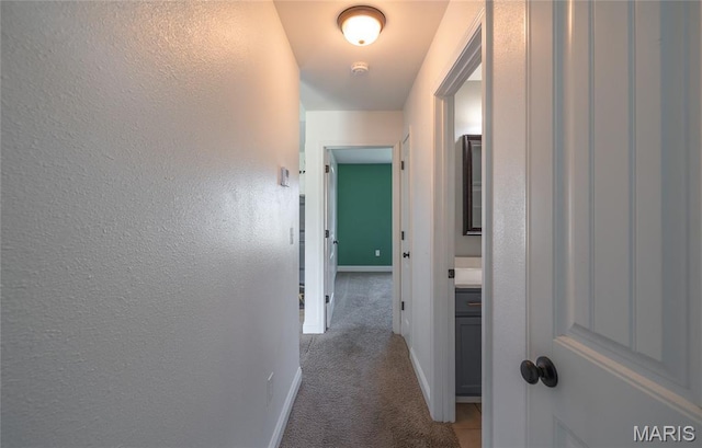111 Brush Creek Pkwy, Saint Robert, MO 65584 - corridor with carpet flooring and baseboards