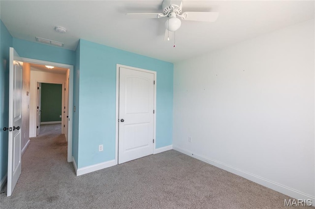 111 Brush Creek Pkwy, Saint Robert, MO 65584 - unfurnished bedroom featuring carpet and a ceiling fan