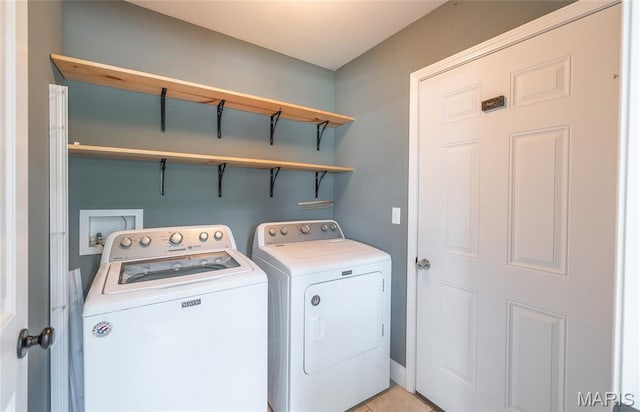 111 Brush Creek Pkwy, Saint Robert, MO 65584 - laundry room featuring separate washer and dryer