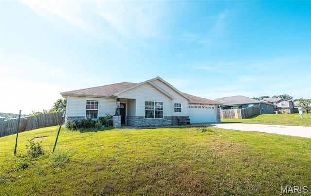 111 Brush Creek Pkwy, Saint Robert, MO 65584 - ranch-style house with driveway, a garage, and stone siding