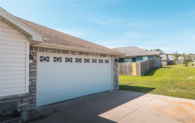 111 Brush Creek Pkwy, Saint Robert, MO 65584 - garage featuring concrete driveway