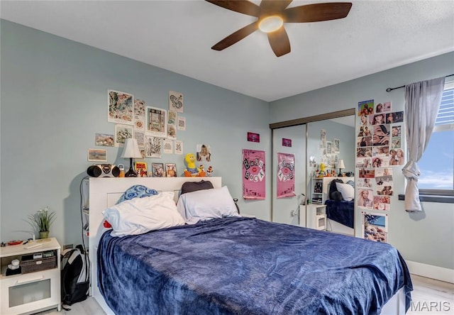 225 Hemingway Ln Unit F, Weldon Spring, MO 63304 - bedroom featuring a closet, light wood finished floors, and a ceiling fan