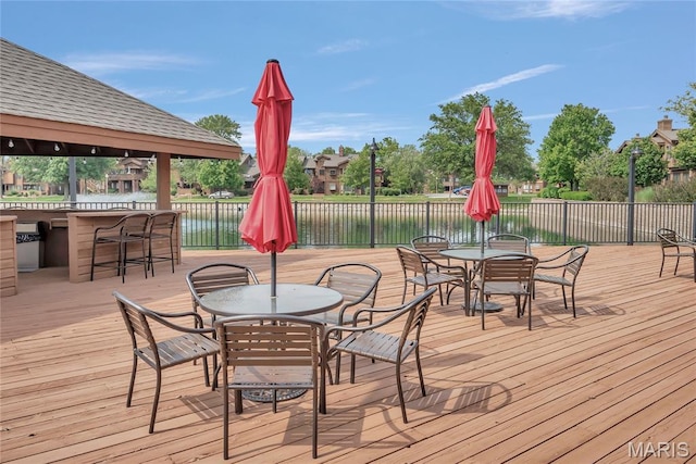 225 Hemingway Ln Unit F, Weldon Spring, MO 63304 - wooden terrace with outdoor dining area and a water view