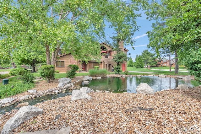 225 Hemingway Ln Unit F, Weldon Spring, MO 63304 - view of front of home featuring a front lawn