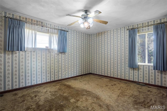 4831 S State Route 159, Glen Carbon, IL 62034 - carpeted spare room featuring a ceiling fan and baseboards