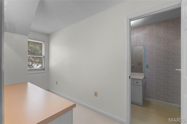 2615 Saddle Ridge Ln, Cape Girardeau, MO 63701 - unfurnished office with baseboards and a textured ceiling