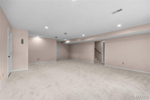 2615 Saddle Ridge Ln, Cape Girardeau, MO 63701 - finished basement with recessed lighting, stairway, and light carpet