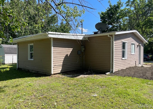 1115 Saint Michael Dr, Cahokia, IL 62206 - view of property exterior featuring a lawn