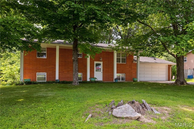 1131 Kimbel Ln, Jackson, MO 63755 - raised ranch with brick siding, a front lawn, and an attached garage