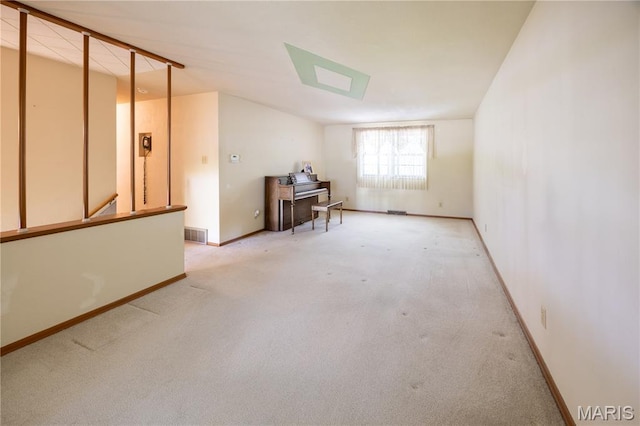 1131 Kimbel Ln, Jackson, MO 63755 - spare room featuring light colored carpet and baseboards