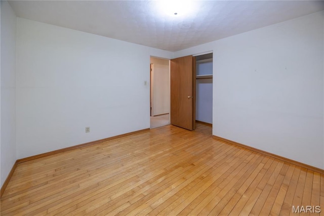 1131 Kimbel Ln, Jackson, MO 63755 - unfurnished bedroom featuring light wood-style flooring and a closet