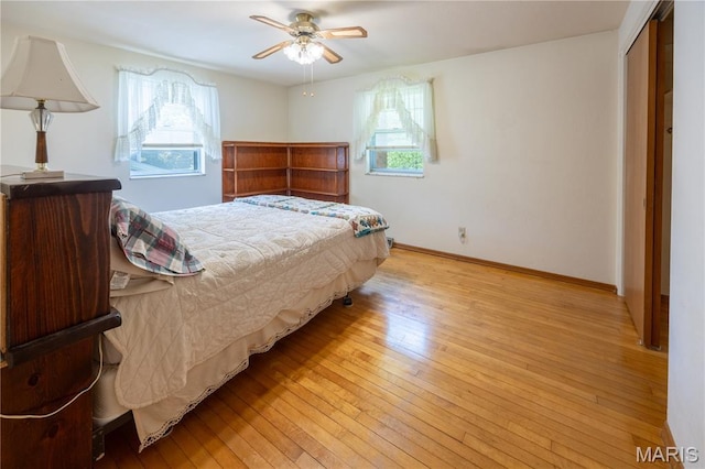 1131 Kimbel Ln, Jackson, MO 63755 - bedroom featuring hardwood / wood-style flooring, a closet, and ceiling fan