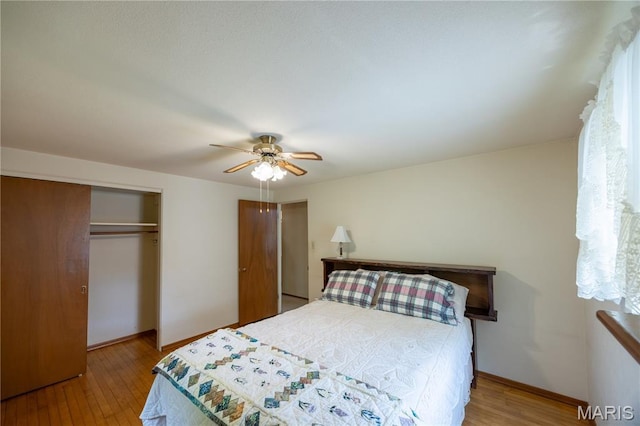 1131 Kimbel Ln, Jackson, MO 63755 - bedroom with wood finished floors, a closet, and a ceiling fan