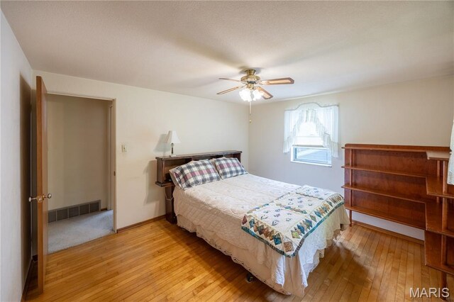 1131 Kimbel Ln, Jackson, MO 63755 - bedroom with light wood-type flooring and ceiling fan