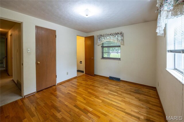 1131 Kimbel Ln, Jackson, MO 63755 - unfurnished bedroom with light wood-style flooring and baseboards