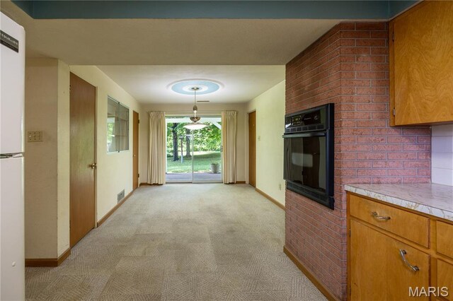 1131 Kimbel Ln, Jackson, MO 63755 - corridor featuring light carpet and baseboards