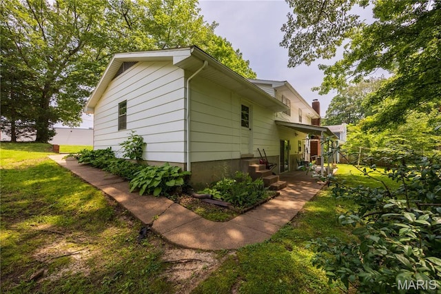 1131 Kimbel Ln, Jackson, MO 63755 - view of home's exterior featuring a yard