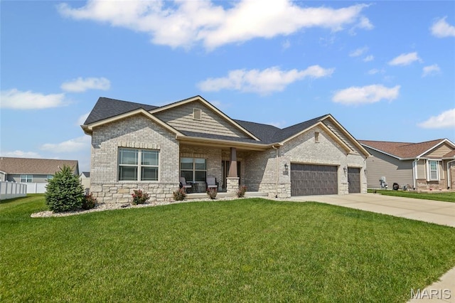 2626 Waldon Ln, Belleville, IL 62221 - craftsman inspired home with an attached garage, a porch, driveway, and a front lawn