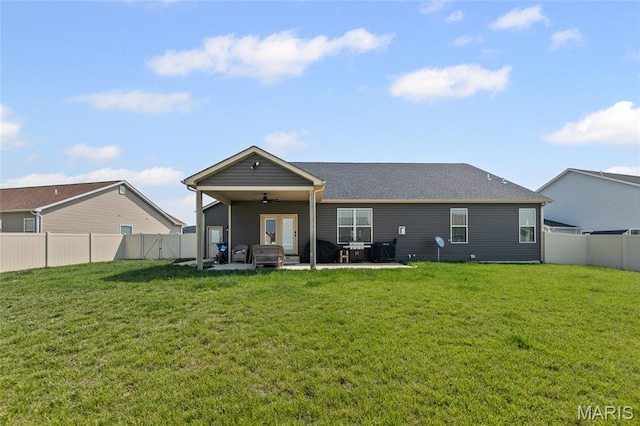 2626 Waldon Ln, Belleville, IL 62221 - back of property featuring ceiling fan, a patio area, and a fenced backyard