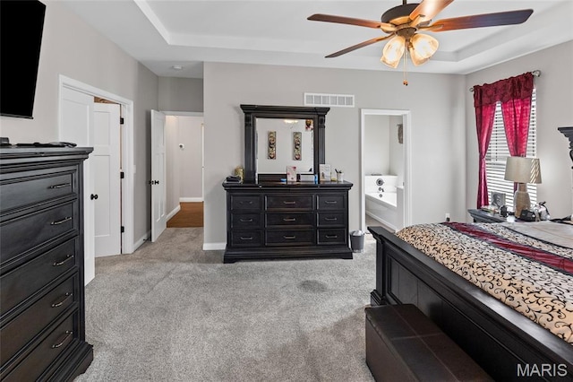 2626 Waldon Ln, Belleville, IL 62221 - bedroom with light colored carpet, a raised ceiling, and ceiling fan