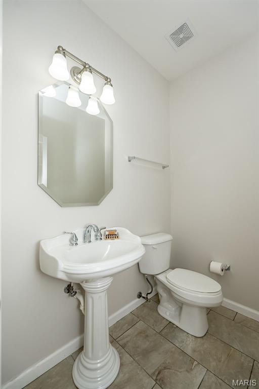 86 Homefield Square Ct, Ofallon, MO 63366 - half bath with toilet and tile patterned flooring