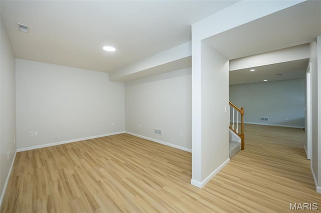 86 Homefield Square Ct, Ofallon, MO 63366 - spare room with stairway, light wood finished floors, and recessed lighting