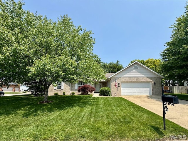 829 Clemson Ave, Fairview Heights, IL 62208 - view of front of home with a garage, driveway, and brick siding