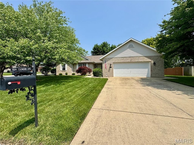 829 Clemson Ave, Fairview Heights, IL 62208 - single story home with an attached garage, driveway, and brick siding