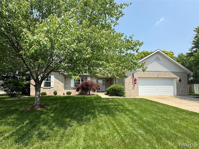 829 Clemson Ave, Fairview Heights, IL 62208 - view of front of home featuring concrete driveway, an attached garage, a front yard, and brick siding