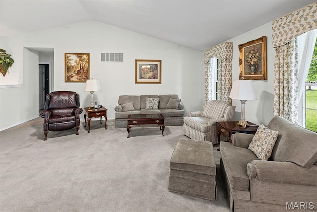 829 Clemson Ave, Fairview Heights, IL 62208 - carpeted living area featuring lofted ceiling and baseboards