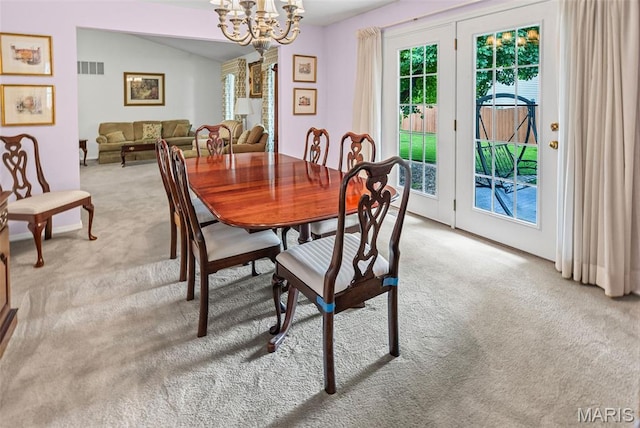 829 Clemson Ave, Fairview Heights, IL 62208 - carpeted dining room with a chandelier and lofted ceiling